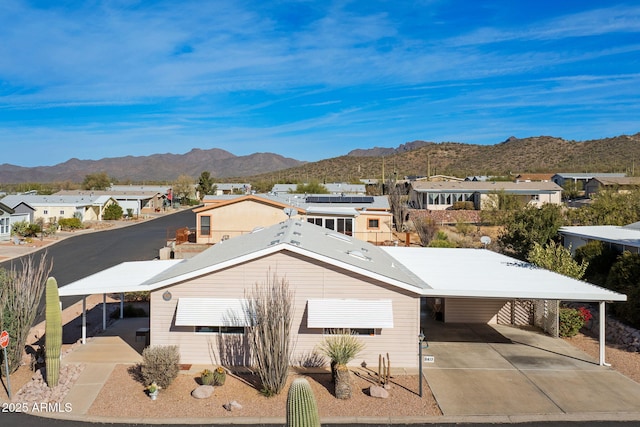 exterior space featuring a mountain view