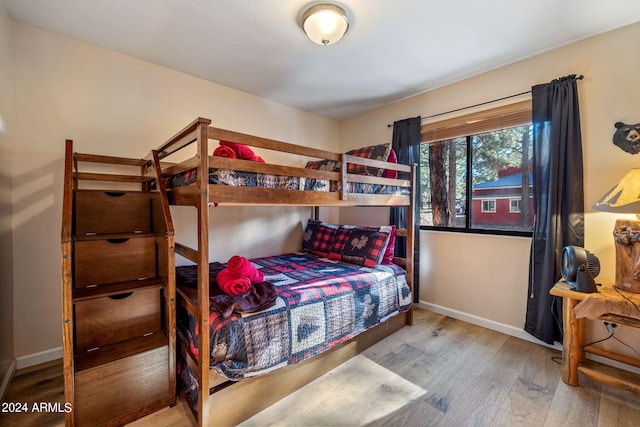 bedroom featuring hardwood / wood-style flooring