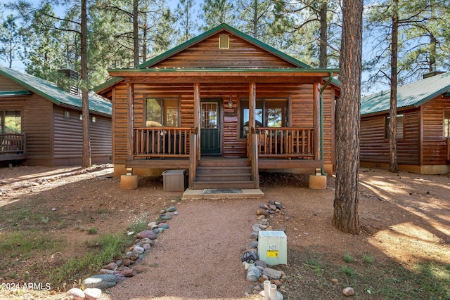 view of front of property featuring covered porch