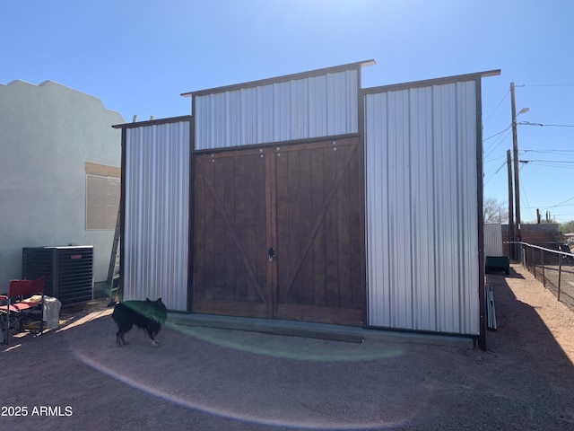 view of outdoor structure featuring cooling unit