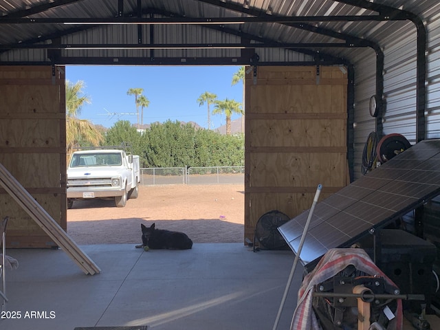 garage featuring a carport