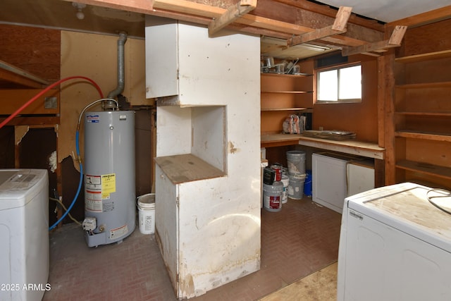 basement with separate washer and dryer and water heater