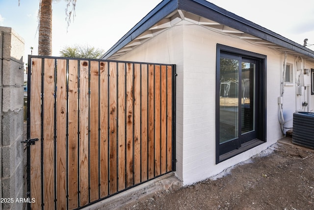 view of home's exterior with cooling unit