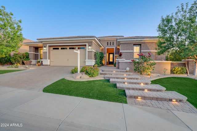 prairie-style house featuring a garage