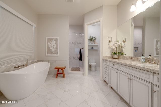 full bathroom featuring independent shower and bath, toilet, and vanity