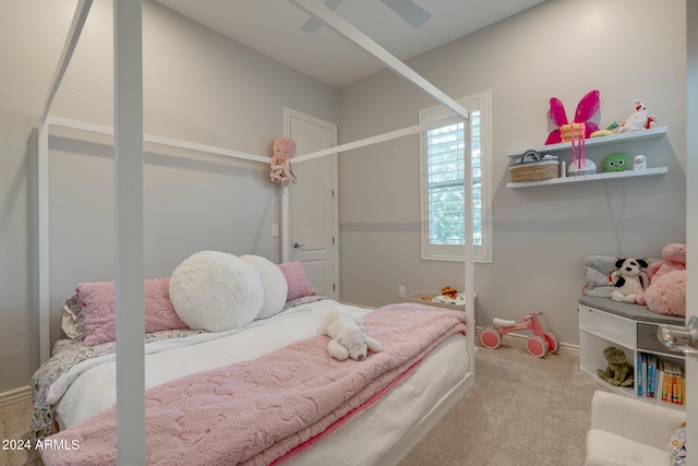 bedroom featuring ceiling fan and carpet floors