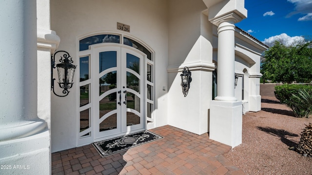 3126 E Fruitvale Ct, Gilbert, AZ 85297 - view of exterior entry featuring french doors and stucco siding