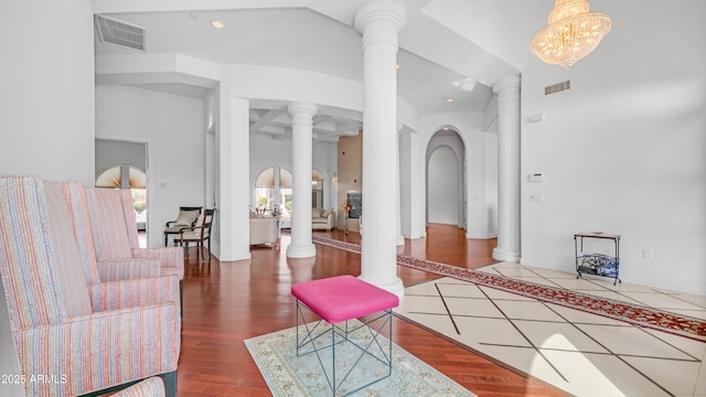 3126 E Fruitvale Ct, Gilbert, AZ 85297 - living area featuring decorative columns and arched walkways