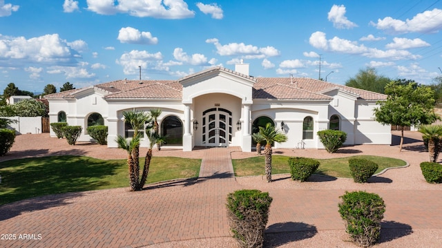 3126 E Fruitvale Ct, Gilbert, AZ 85297 - view of front facade featuring stucco siding, a tile roof, and a front lawn