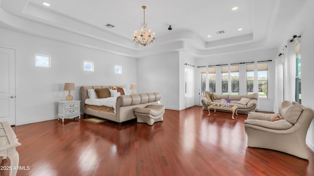3126 E Fruitvale Ct, Gilbert, AZ 85297 - living room with a raised ceiling, a chandelier, wood finished floors, recessed lighting, and baseboards