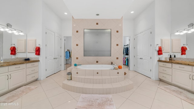 3126 E Fruitvale Ct, Gilbert, AZ 85297 - bathroom with a bath, a closet, tile patterned floors, vanity, and recessed lighting