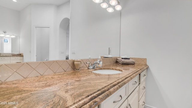 3126 E Fruitvale Ct, Gilbert, AZ 85297 - bathroom featuring vanity and backsplash