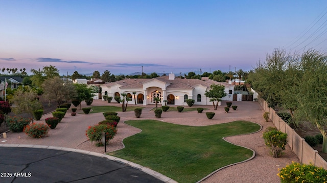 3126 E Fruitvale Ct, Gilbert, AZ 85297 - mediterranean / spanish house featuring curved driveway and stucco siding
