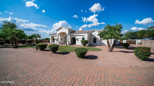3126 E Fruitvale Ct, Gilbert, AZ 85297 - mediterranean / spanish home with a chimney and stucco siding