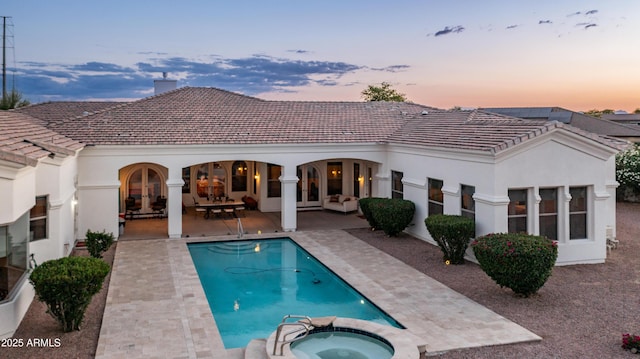 3126 E Fruitvale Ct, Gilbert, AZ 85297 - rear view of property featuring a patio, stucco siding, a chimney, and a tile roof