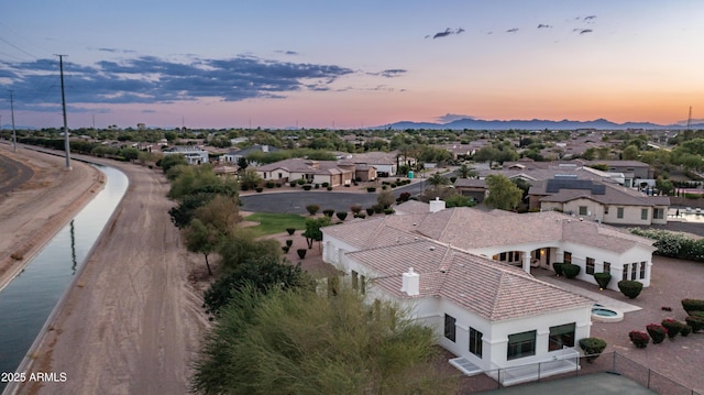 3126 E Fruitvale Ct, Gilbert, AZ 85297 - aerial view at dusk of a residential view and a mountain view