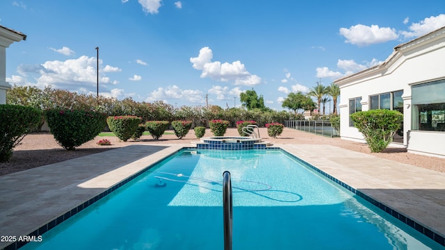 3126 E Fruitvale Ct, Gilbert, AZ 85297 - view of swimming pool with a pool with connected hot tub and a patio area