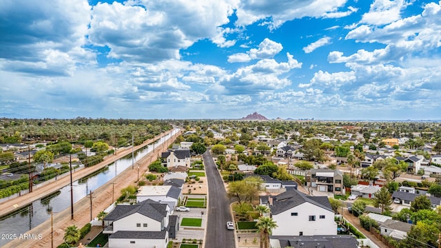 aerial view featuring a water view and a residential view