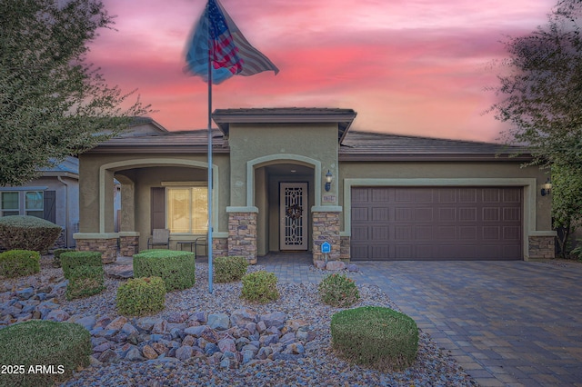 view of front of property with a garage