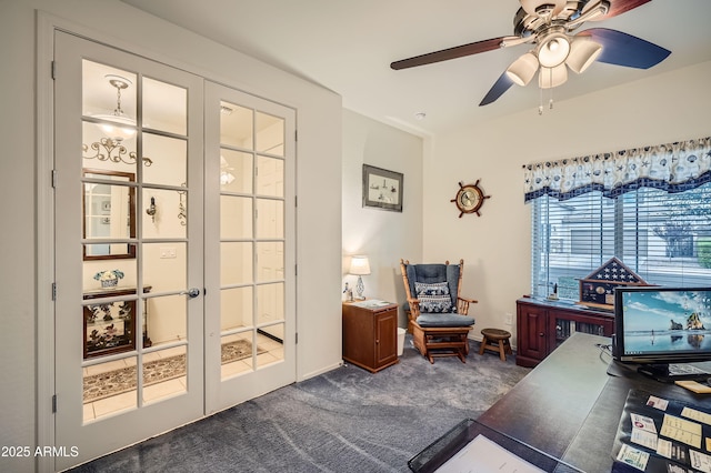 carpeted home office with ceiling fan and french doors