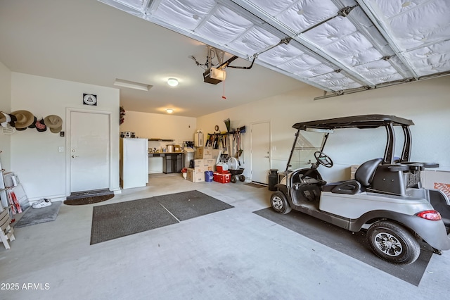 garage featuring a garage door opener