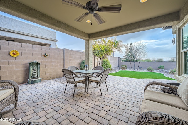 view of patio with ceiling fan