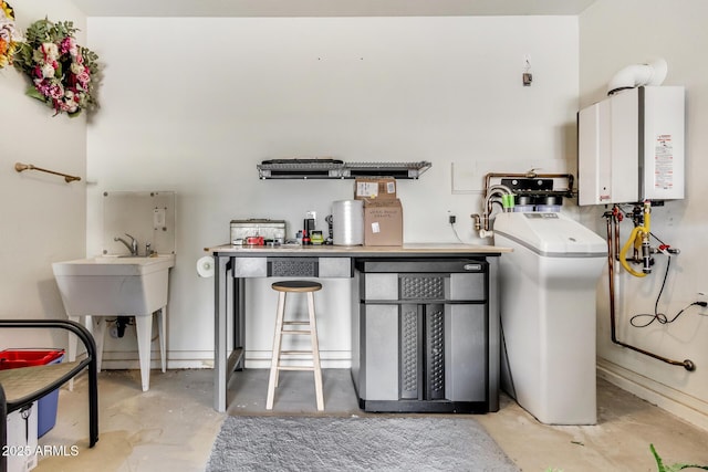 laundry area with tankless water heater