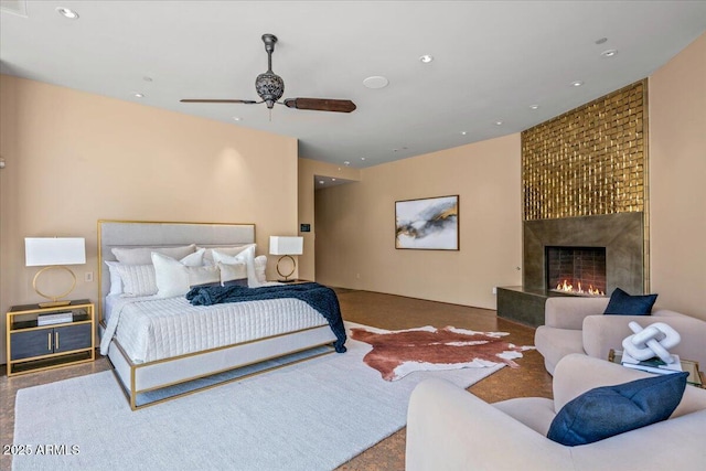 43105 N 102nd St, Scottsdale, AZ 85262 - carpeted bedroom with recessed lighting, a ceiling fan, and a fireplace