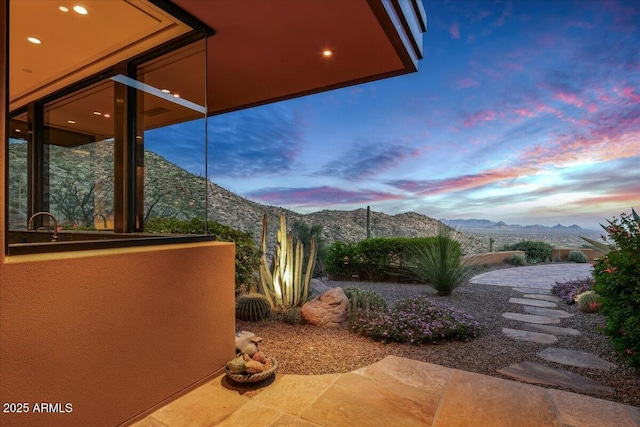 exterior space featuring a mountain view