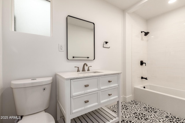 full bathroom with tiled shower / bath combo, vanity, tile patterned floors, and toilet