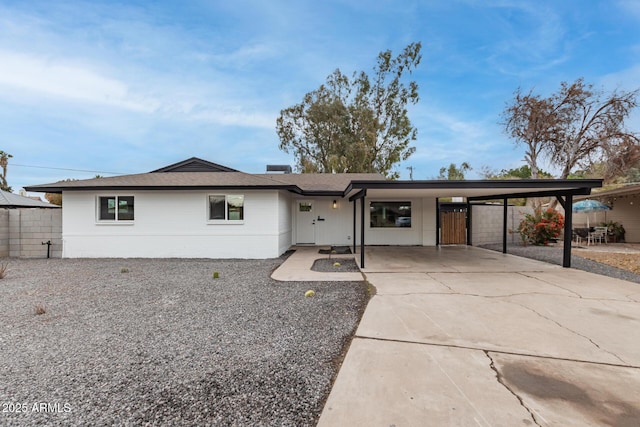 single story home with a carport