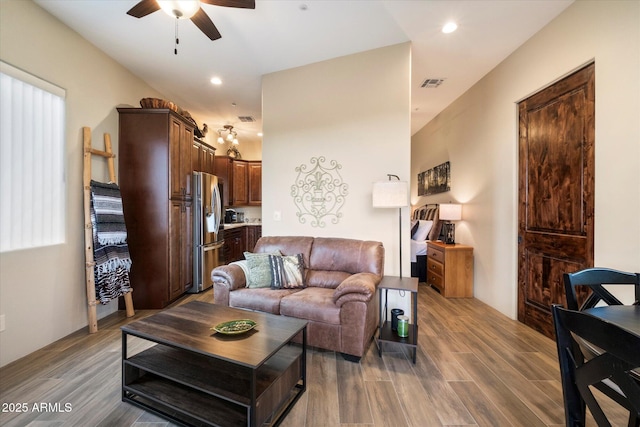 living room with ceiling fan