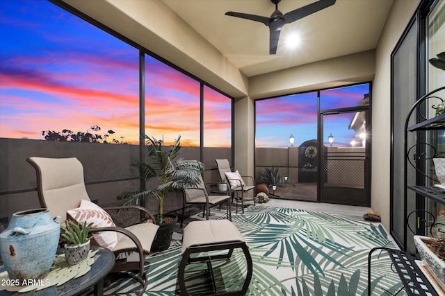 sunroom / solarium with ceiling fan