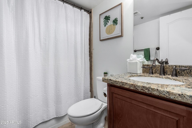 full bathroom with vanity, toilet, and shower / bath combo with shower curtain