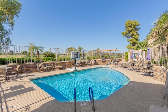 view of pool featuring a pergola and a patio area