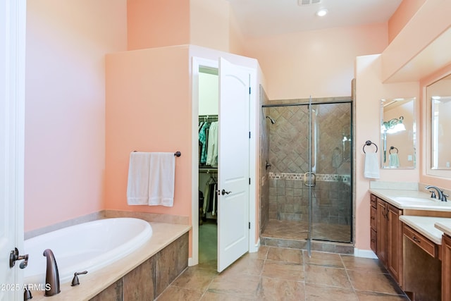32731 N 74th Way, Scottsdale, AZ 85266 - bathroom featuring vanity, a shower stall, a garden tub, and a spacious closet