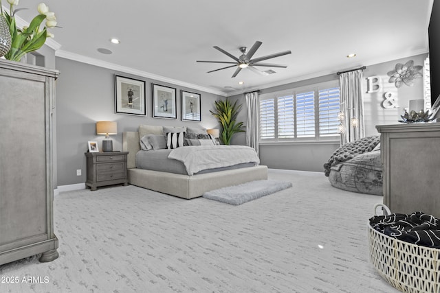 carpeted bedroom with ceiling fan and ornamental molding