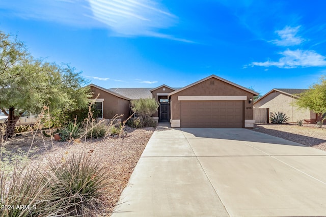 single story home with a garage