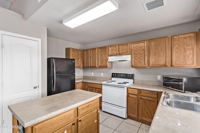 kitchen with a center island, black fridge, sink, light tile patterned floors, and white electric range oven