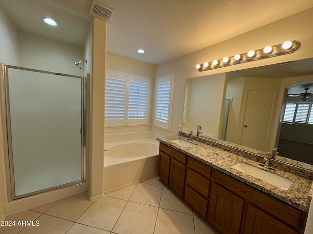 bathroom with vanity, separate shower and tub, a wealth of natural light, and ceiling fan