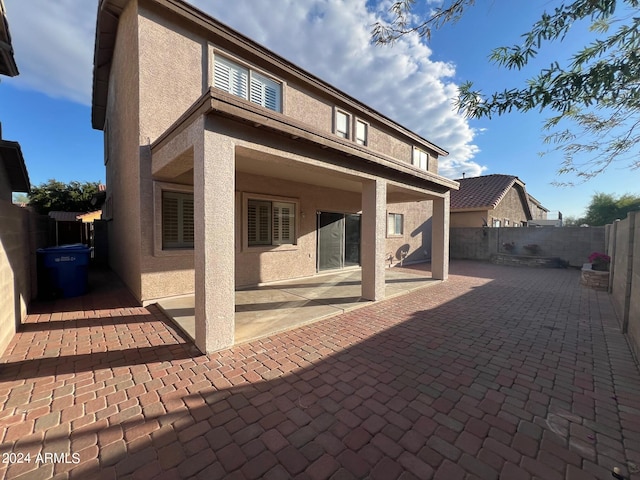 rear view of house with a patio