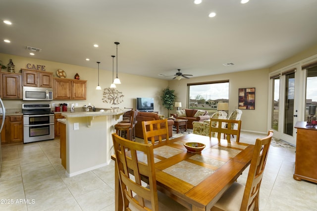 dining room featuring light tile patterned floors, visible vents, recessed lighting, and a ceiling fan