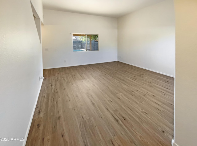 unfurnished room with light hardwood / wood-style floors