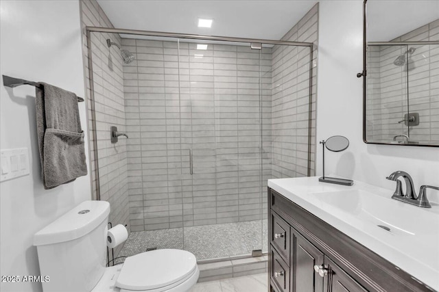 3505 N Miller Rd, Scottsdale, AZ 85251 - bathroom featuring toilet, vanity, a shower stall, and marble finish floors