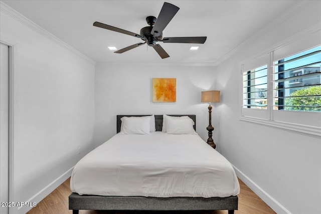 3505 N Miller Rd, Scottsdale, AZ 85251 - bedroom with light wood-type flooring, baseboards, ornamental molding, and a ceiling fan