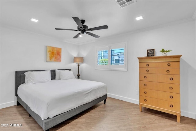 3505 N Miller Rd, Scottsdale, AZ 85251 - bedroom with ornamental molding, baseboards, light wood finished floors, and ceiling fan