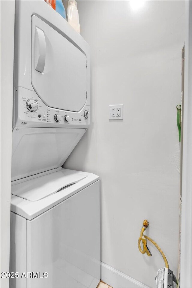 3505 N Miller Rd, Scottsdale, AZ 85251 - washroom featuring stacked washer / dryer