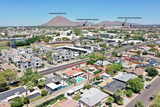 3505 N Miller Rd, Scottsdale, AZ 85251 - aerial view of property and surrounding area featuring a mountainous background and property boundaries highlighted