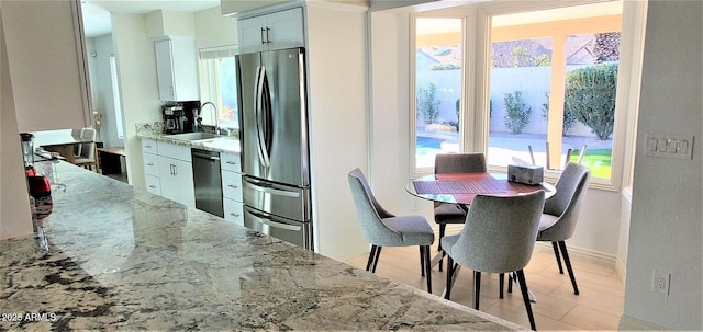 4617 E Emile Zola Ave, Phoenix, AZ 85032 - dining room featuring baseboards