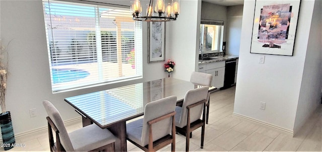 4617 E Emile Zola Ave, Phoenix, AZ 85032 - dining space with a chandelier and baseboards